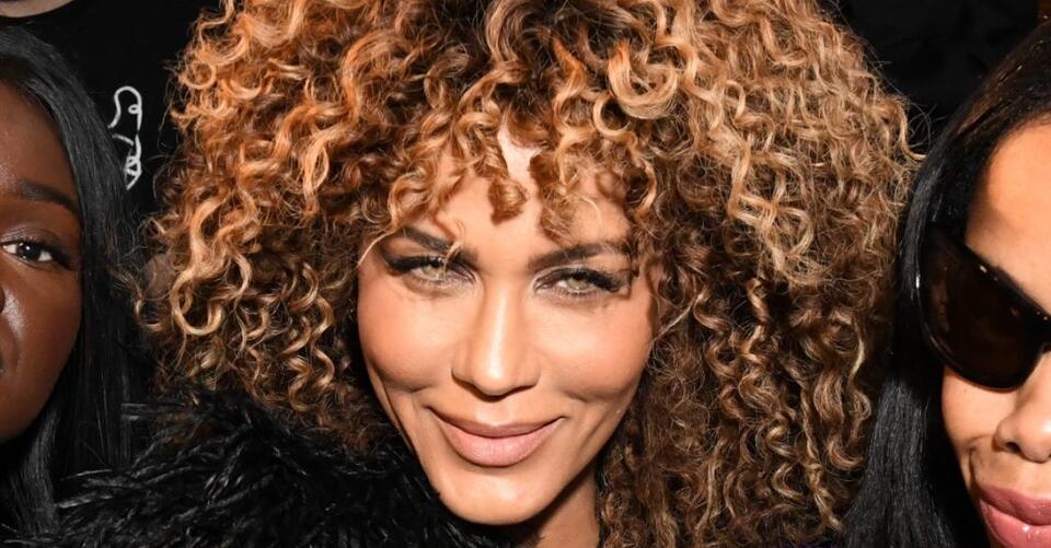 Nicole Ari Parker Takes a Risk in Lace Catsuit, Feather Coat and Over-the-Knee Boots at LaQuan Smith’s Fall 2022 NYFW Show – NewsBreak