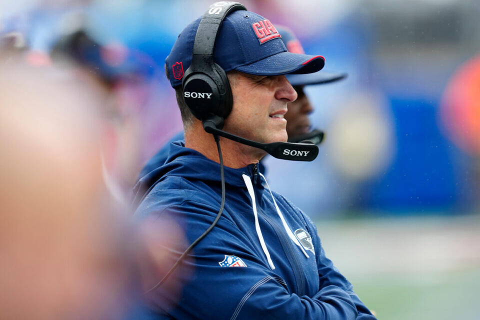 Harbaugh Hints at Possible Shift at Quarterback - NewsBreak