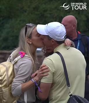 Rory McIlroy's marriage appears to be back on track after divorce u-turn as golfer kisses wife