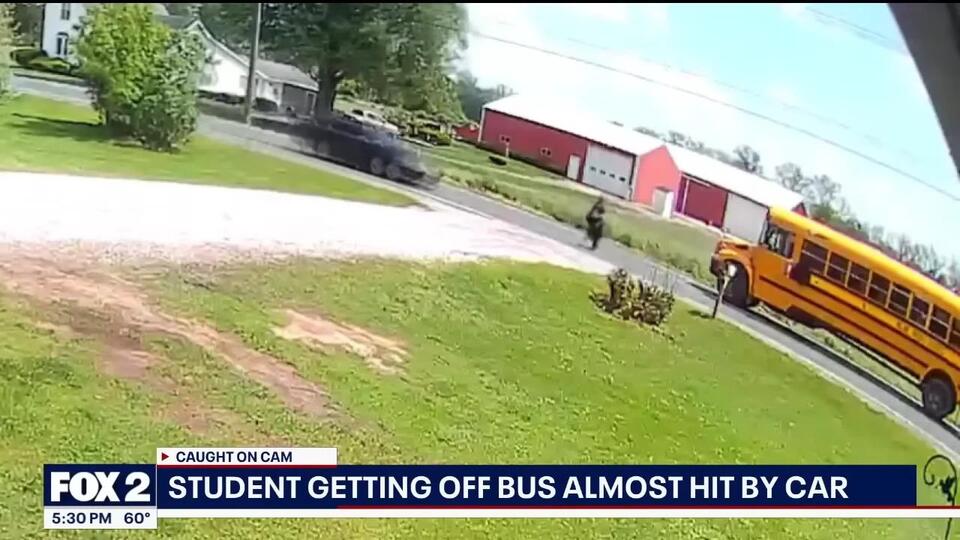 A Driver Blew Past a School Bus Stop Sign and Nearly Hit an 11-Year-Old ...