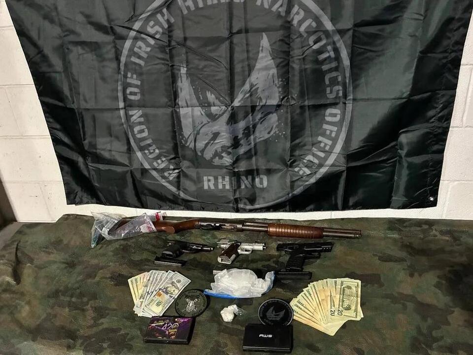 Guns, drugs, cash seized by task force officers during raids in Adrian ...