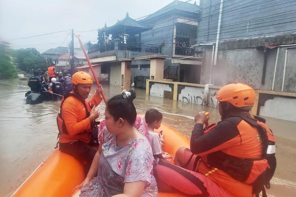 Flash floods in Indonesia leave at least 11 dead and 13 missing - NewsBreak