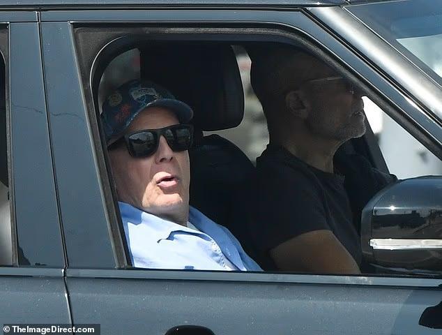 Bruce Willis spotted being driven in LA after news he now lives in separate home