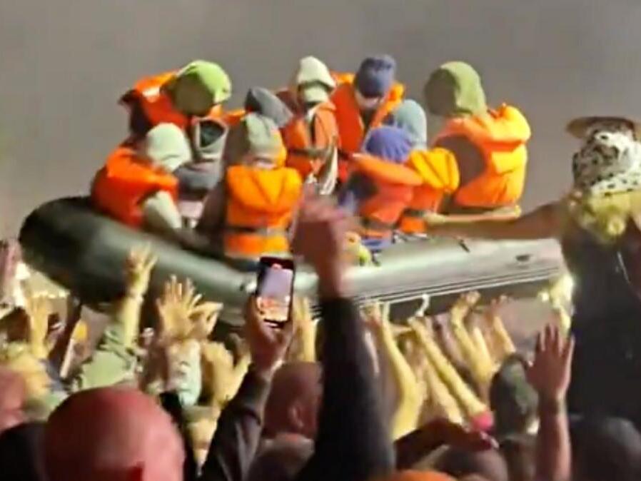 Banksy Launches Inflatable Migrant Rafts at IDLES’ Glastonbury Set