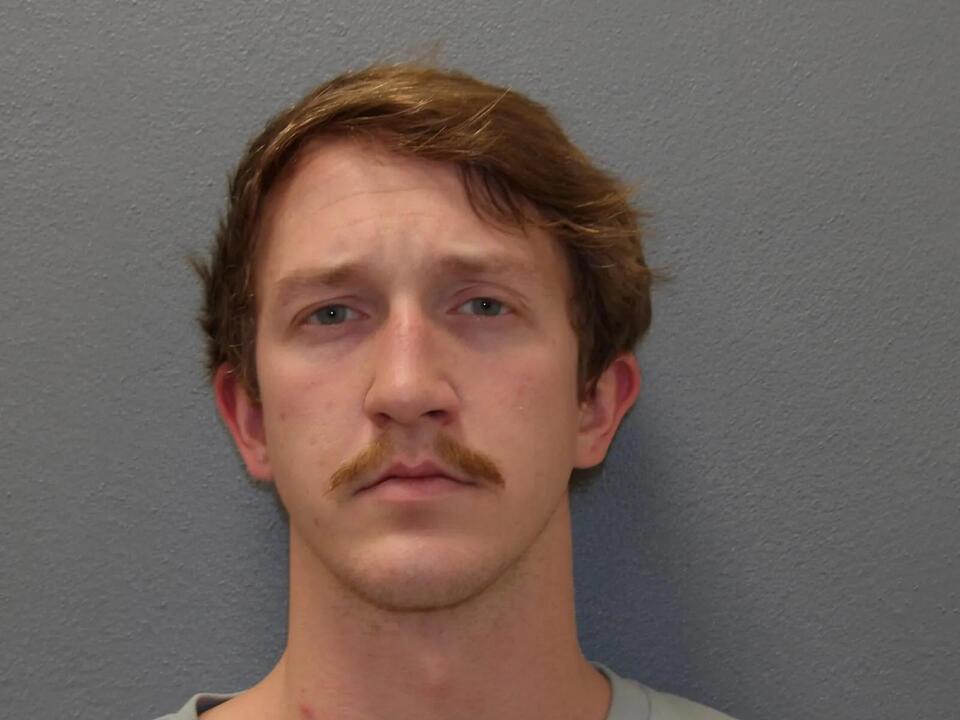 Man arrested for reportedly charging items and services to another person's resort room