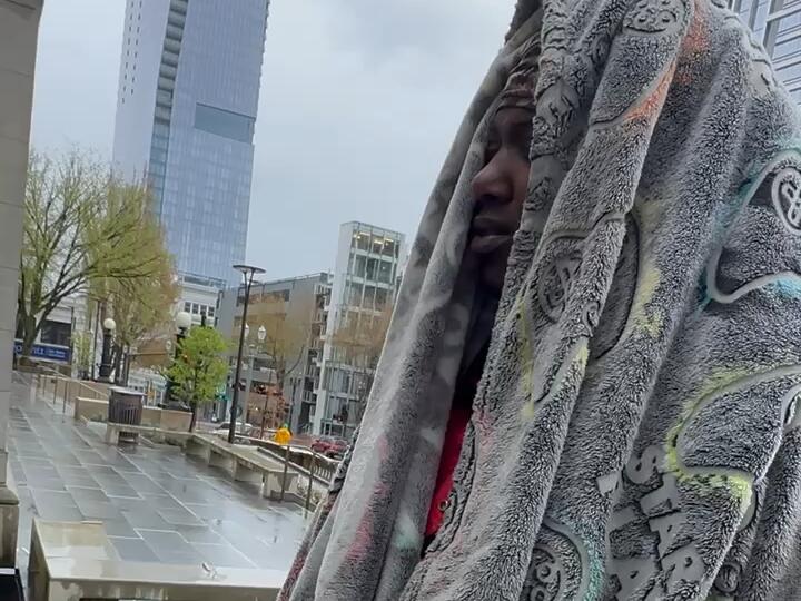 A homeless woman nonchalant about her boyfriend that just overdosed