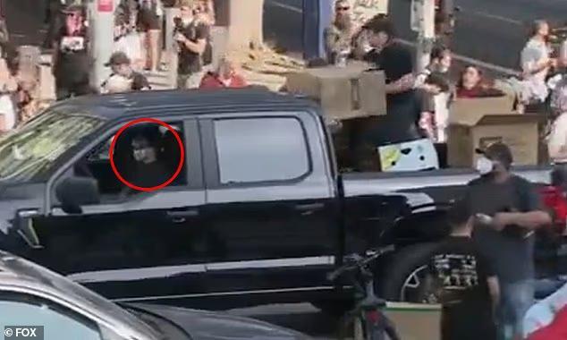 LA menace seen handing out war-time masks during ICE riots is named and ...