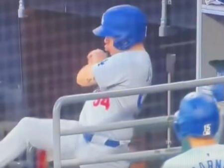 Dodgers batboy saves Shohei Ohtani from foul ball in viral video
