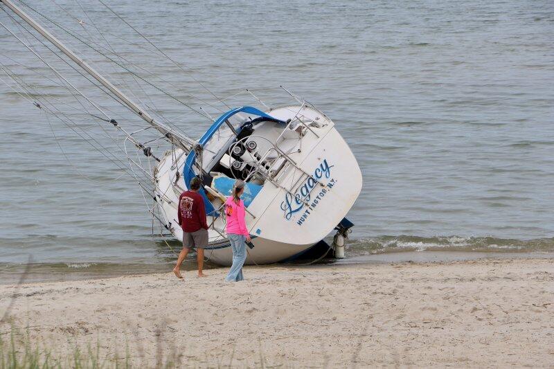 Sailboat aground on Lewes Beach - NewsBreak