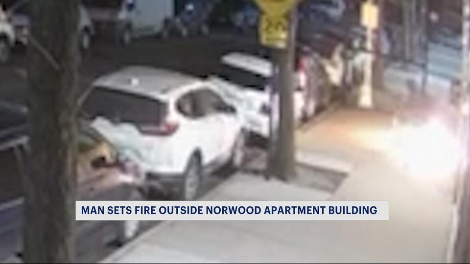 Surveillance video shows man setting fire outside Bronx apartment ...