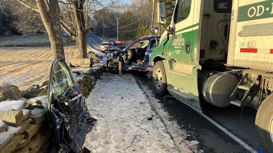 Driver transported to hospital after car crash involving tractor ...