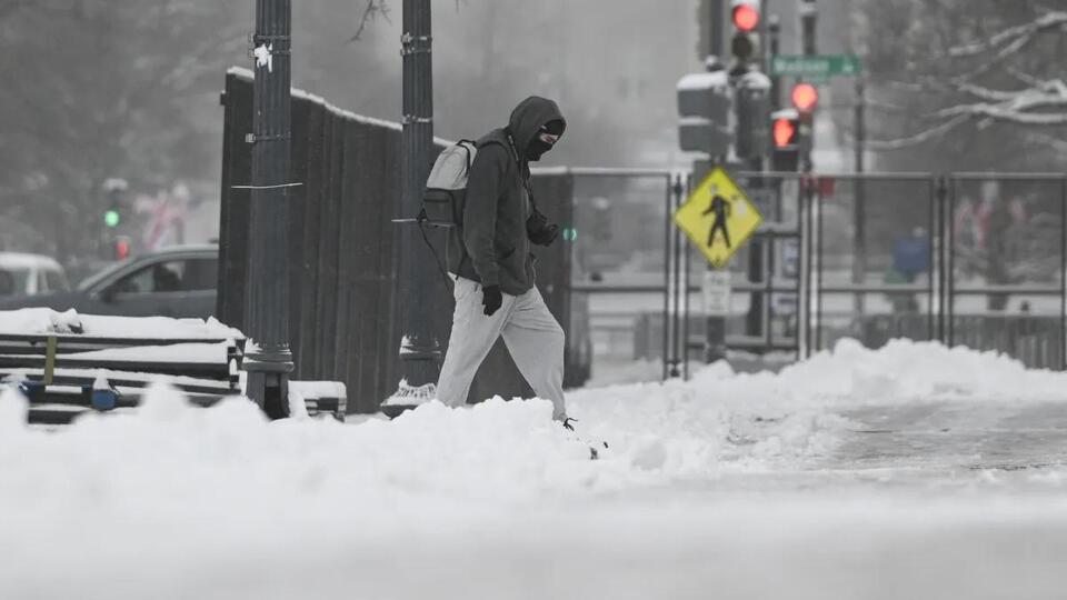 Major winter storm blankets DC area in half a foot of snow or more ...