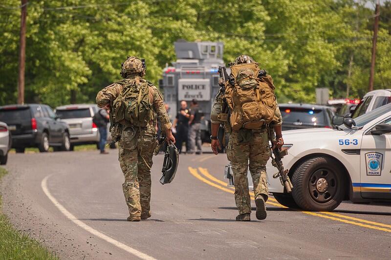Shots fired at police during chase ends in barricade standoff in West ...