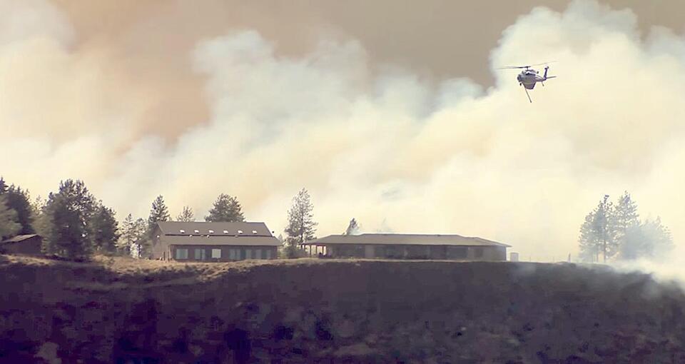 Washington wildfires spread to 5,000-plus acres, 600 structures damaged or destroyed
