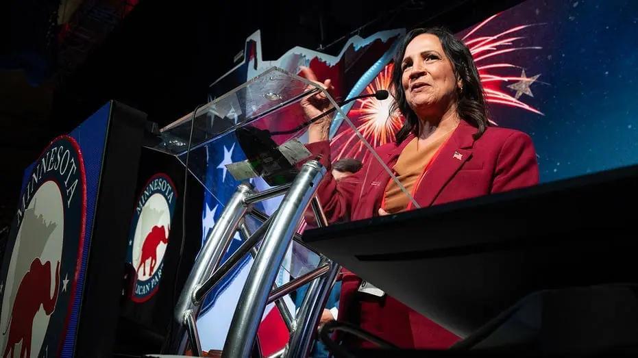 Minnesota GOP chair condemns protesters displaying KKK-themed sign ...