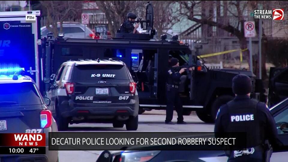 Man charged with armed robbery after barricading himself inside Decatur ...