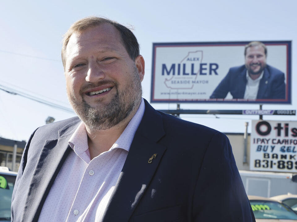 Seaside mayoral candidate Alex Miller is fined for posting political signs early.