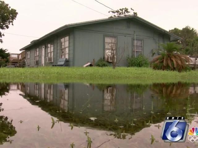 Rockport family cleaning their home after flooding - News ...