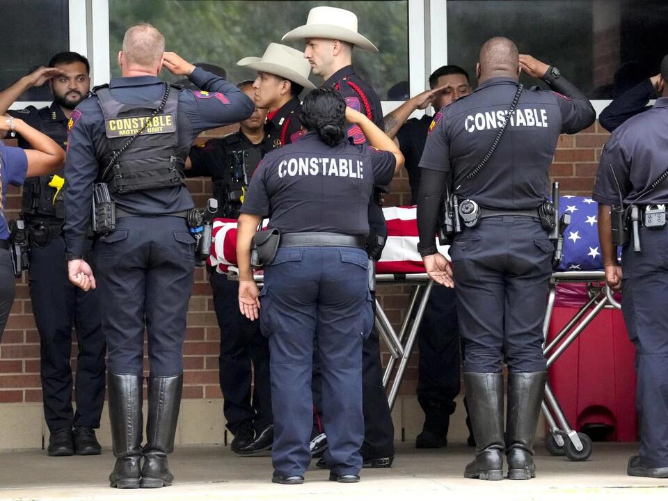 Texas deputy was fatally shot at Houston intersection while driving to