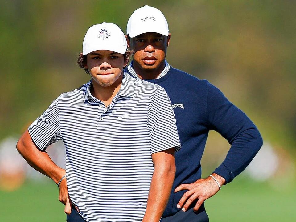 Tiger Woods, son Charlie, hold share the lead for first time after