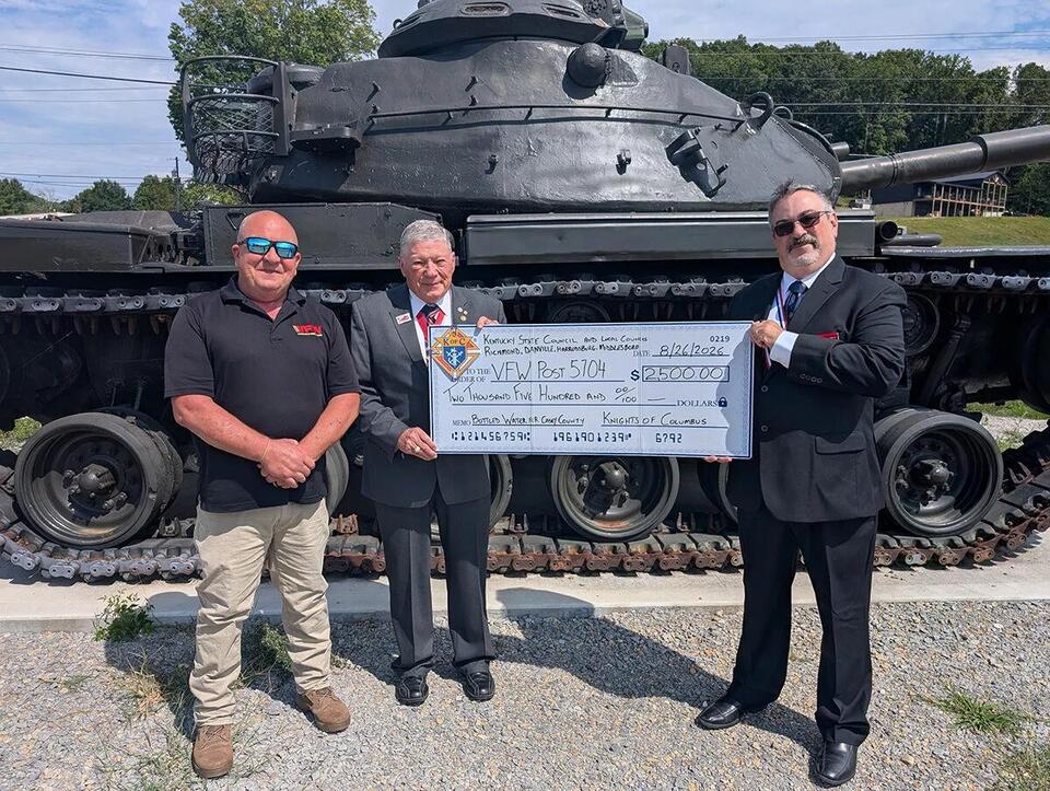 Knights of Columbus donates money for water