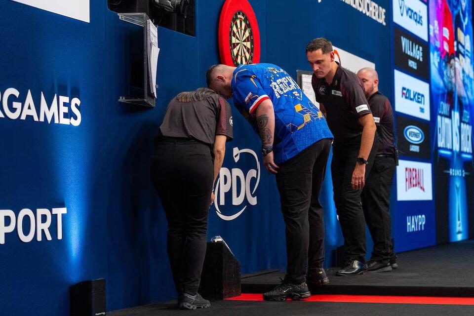 Josh Rock's dart gets caught in a hard place to find in bizarre incident