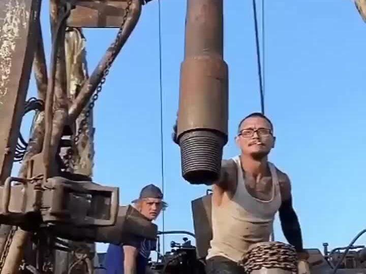 “Floorman on the drilling rig—where strength, skill, and grit meet ...