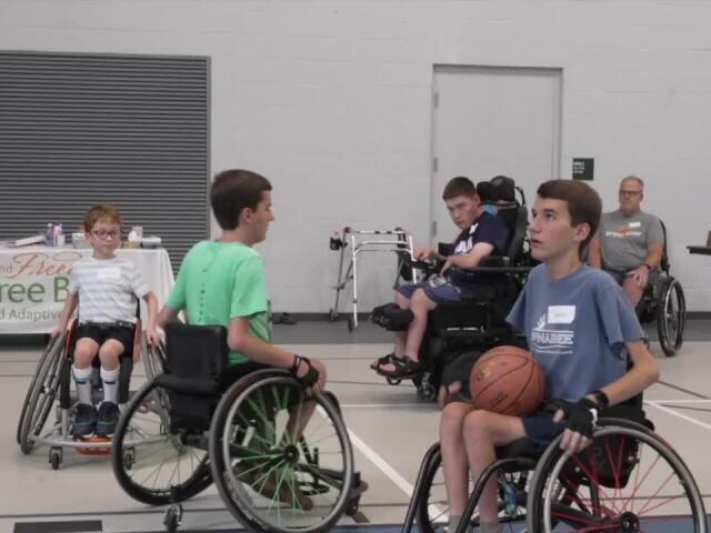 Twins with muscular dystrophy find connection at wheelchair sports camp