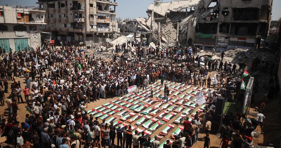 In Gaza, a mass funeral for 112 members of 2 families, three years after deadly Israeli strike