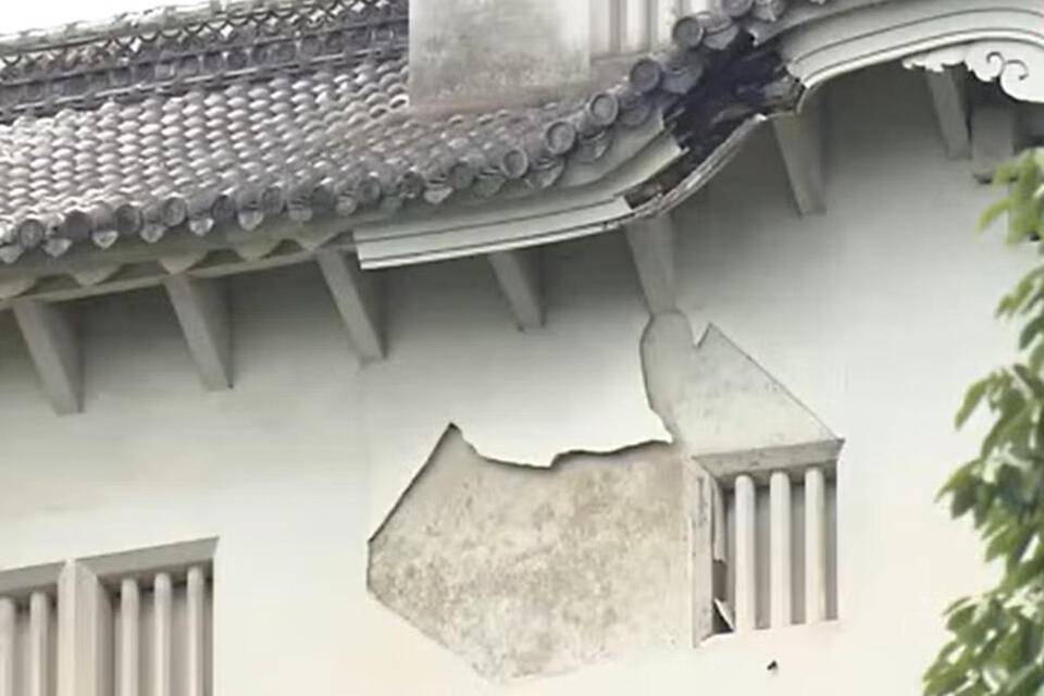 Historic Japanese castle damaged as Typhoon Jangmi rips through region