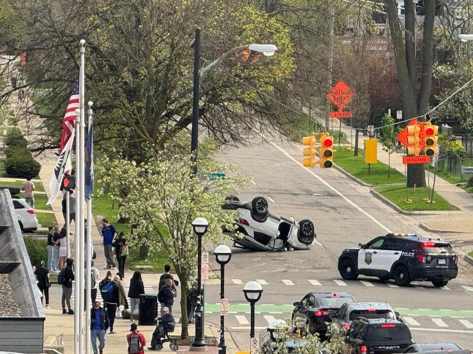 Tesla driver strikes SUV in downtown Ann Arbor, causes car to flip over