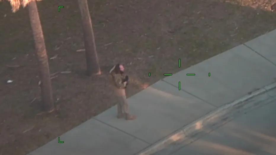 Florida man armed with assault rifle, dressed in tactical gear, shot ...