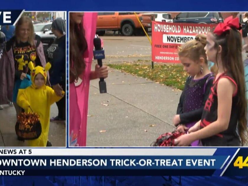 Trickortreaters enjoy a rainy Halloween in downtown Henderson