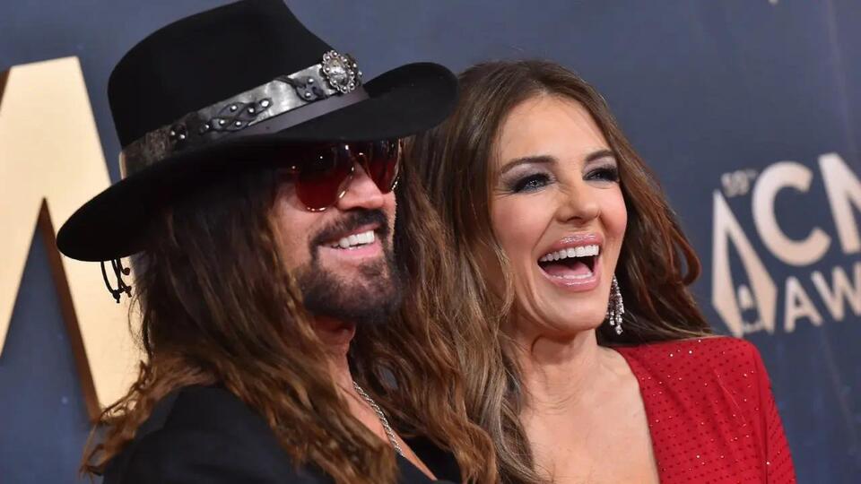 Billy Ray Cyrus Engaged to Elizabeth Hurley After More Than a Year of ...