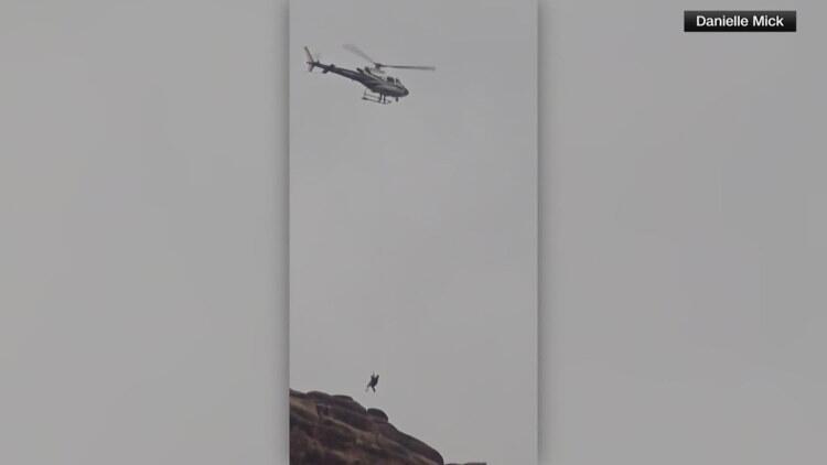 Base jumper rescued from cliff - NewsBreak