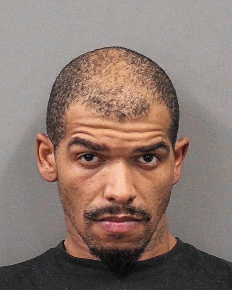 Marietta man accused of running over 2 people at apartment complex ...