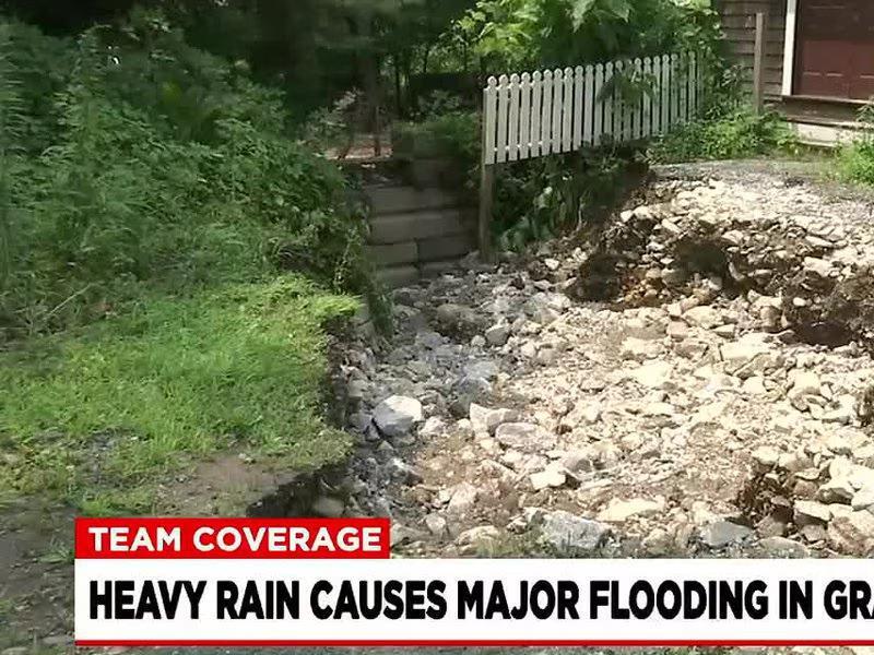 Entire driveways washed out by heavy flooding in Granville
