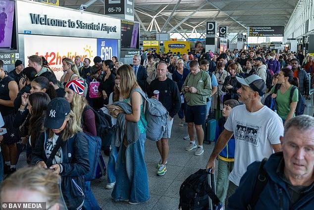 Flights are STILL grounded at UK airports after 'technical failure': Fix 'taking longer than hoped'